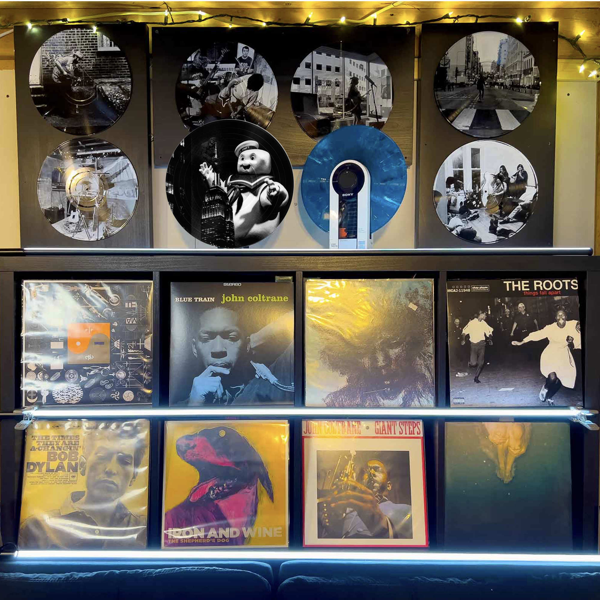 Vinyl record photo art featuring King Kong and Stay Puft in New York City, styled on a gallery wall.