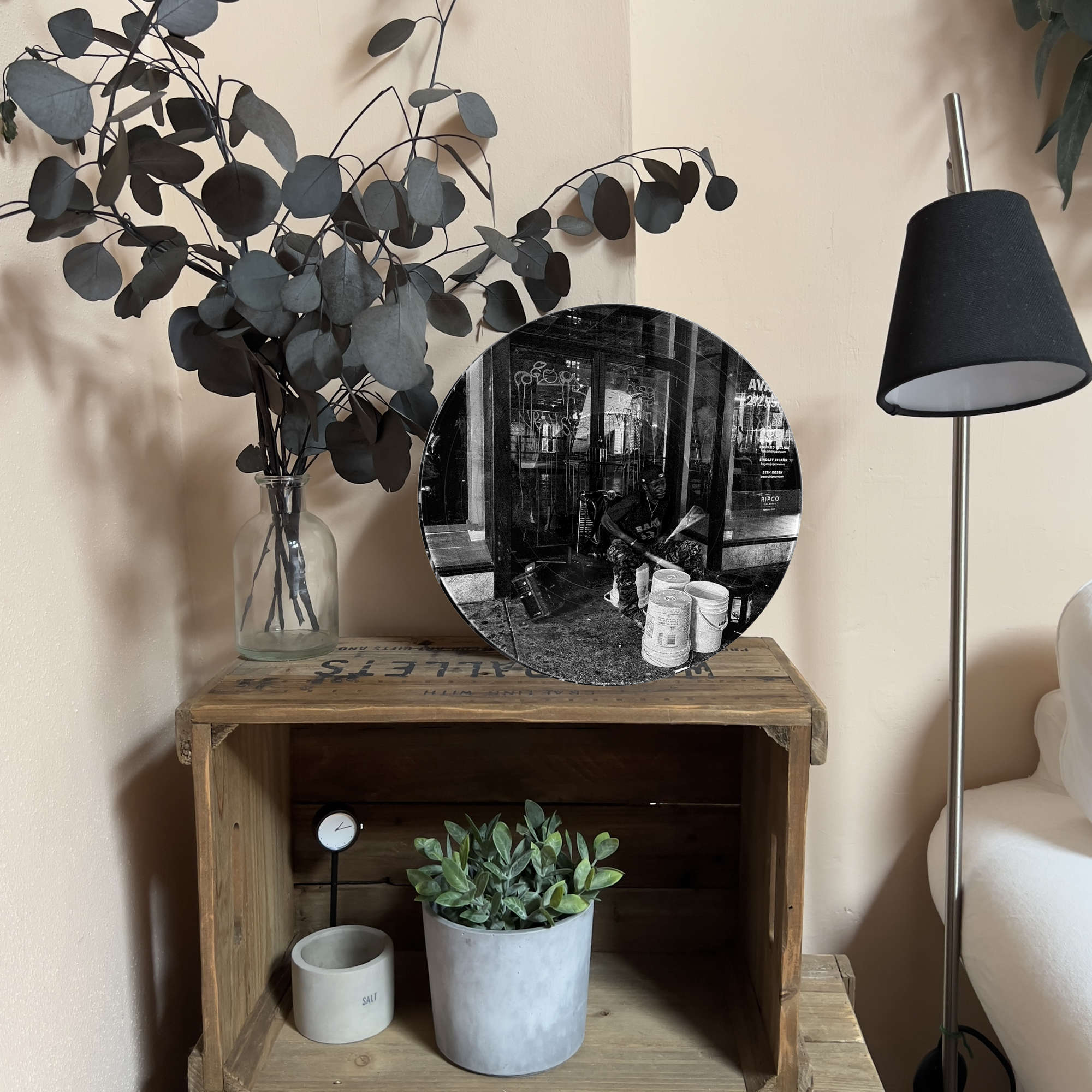 Upcycled vinyl record photo art of a bucket drummer in NYC at night, styled as living room wall decor.