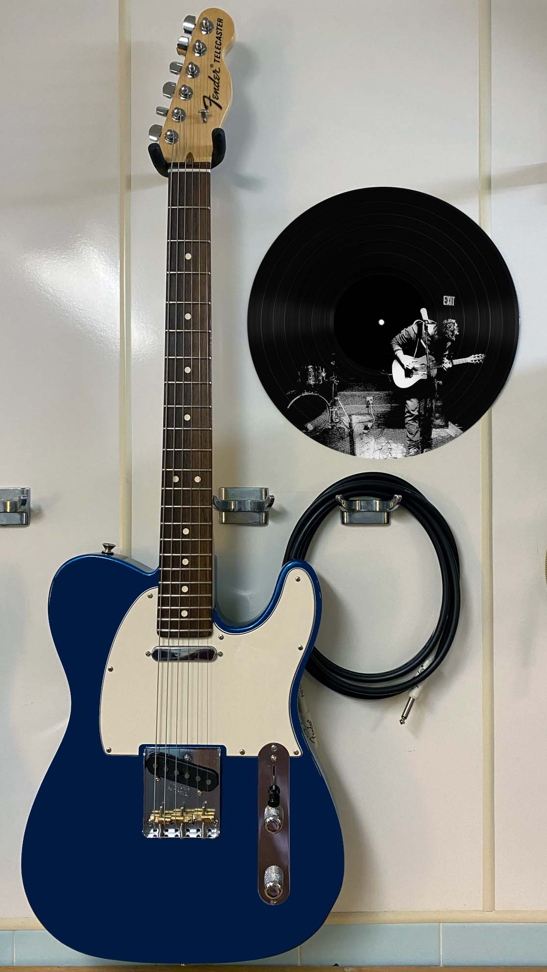 #45 Lone Guitar Player on a Dark Stage